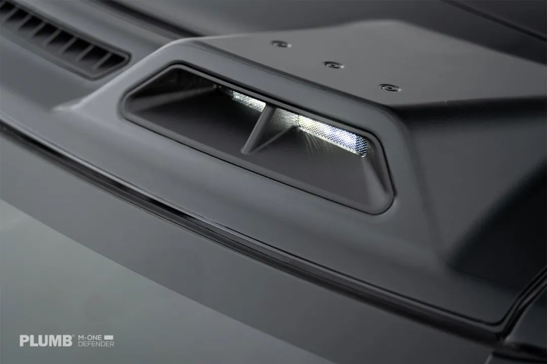 PLUMB M-One Defender roof lighting upgrade