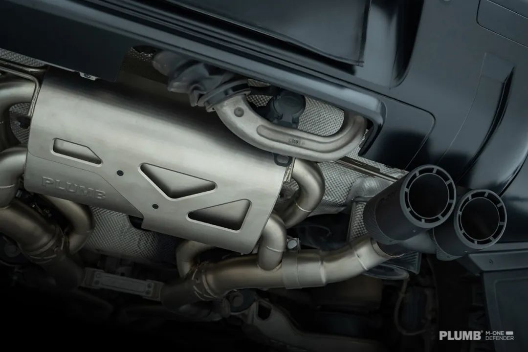 PLUMB M-One carbon and stainless Defender exhaust system