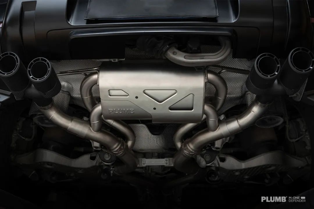 PLUMB M-One Defender electronic exhaust system detail