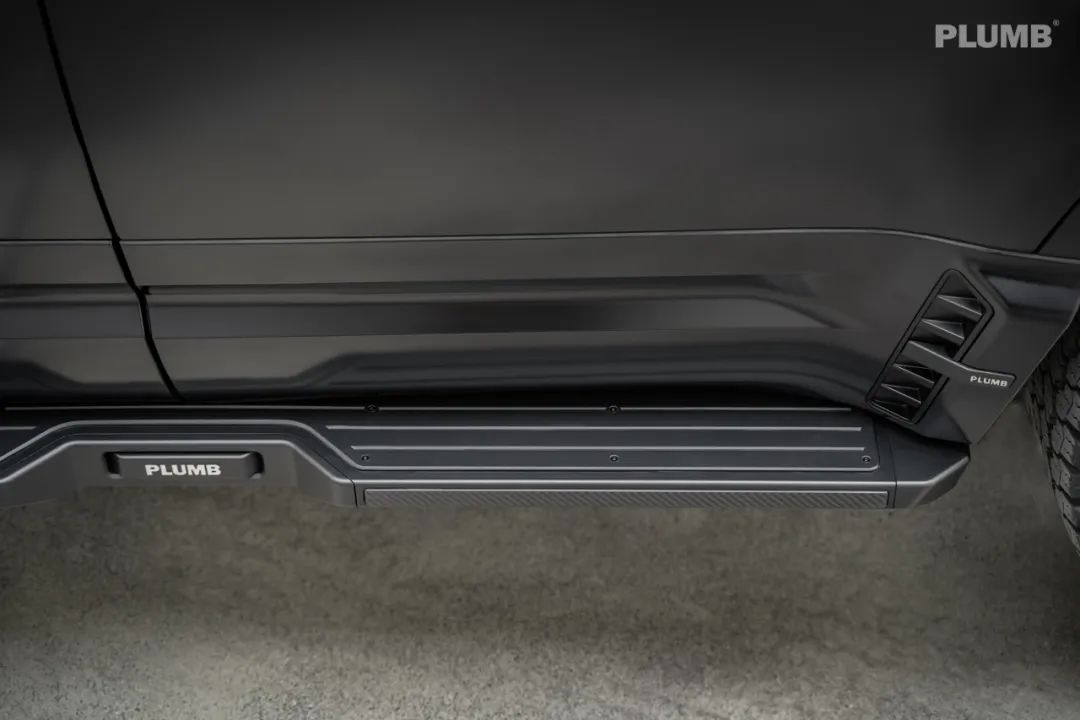 PLUMB M-One Defender side bar close-up